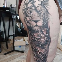 Leeuw en wolf tattoo